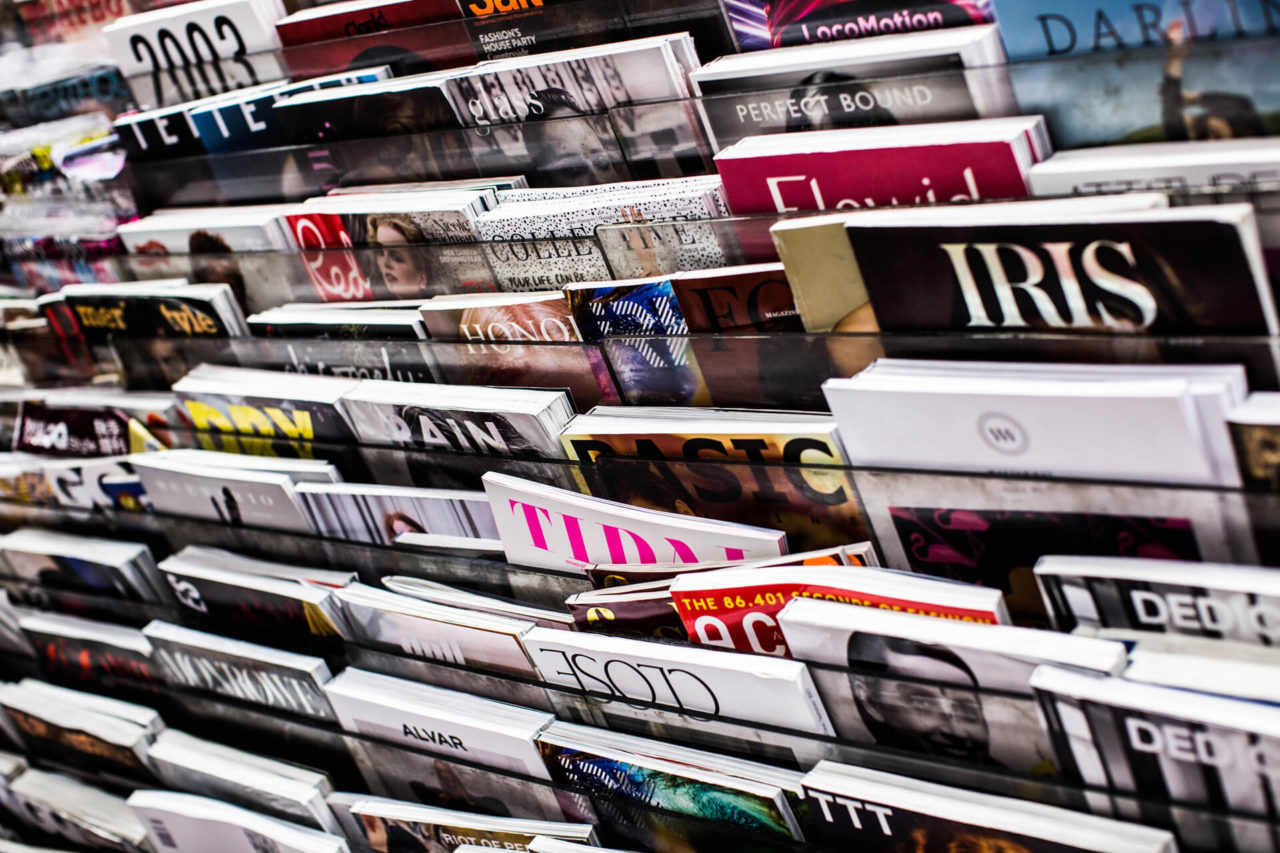 Photo of a rack of books on shelf: Photographer: Charisse Kenion, Unsplash